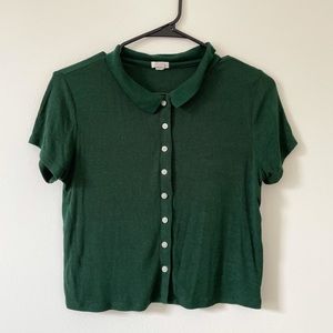 green garage collared tee